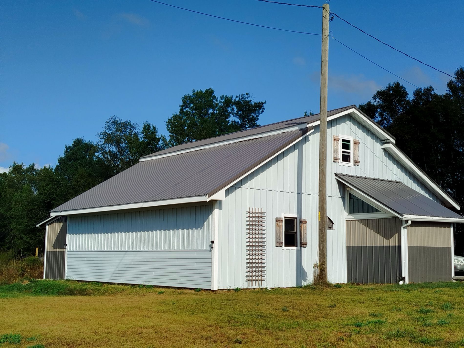  3 car  2 story garage with car port